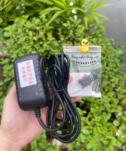 Sạc cắm pin máy lò xo trong suốt